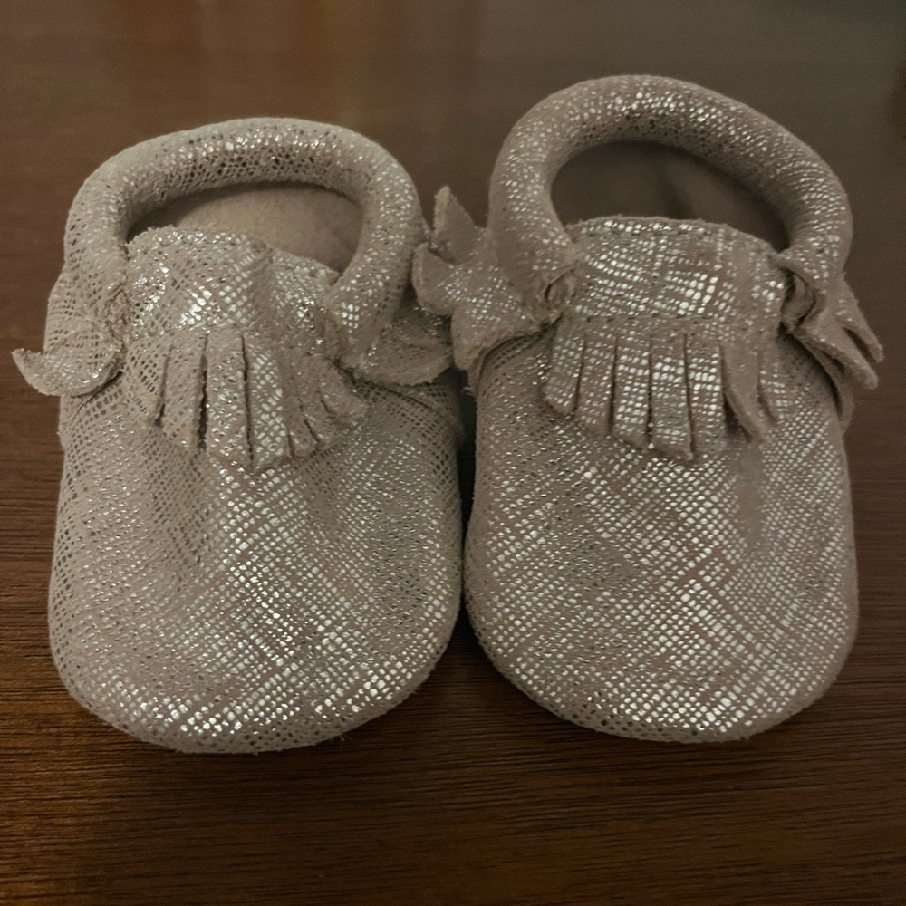 Freshly picked Baby Moccasins shoe size one gold soft sole like new